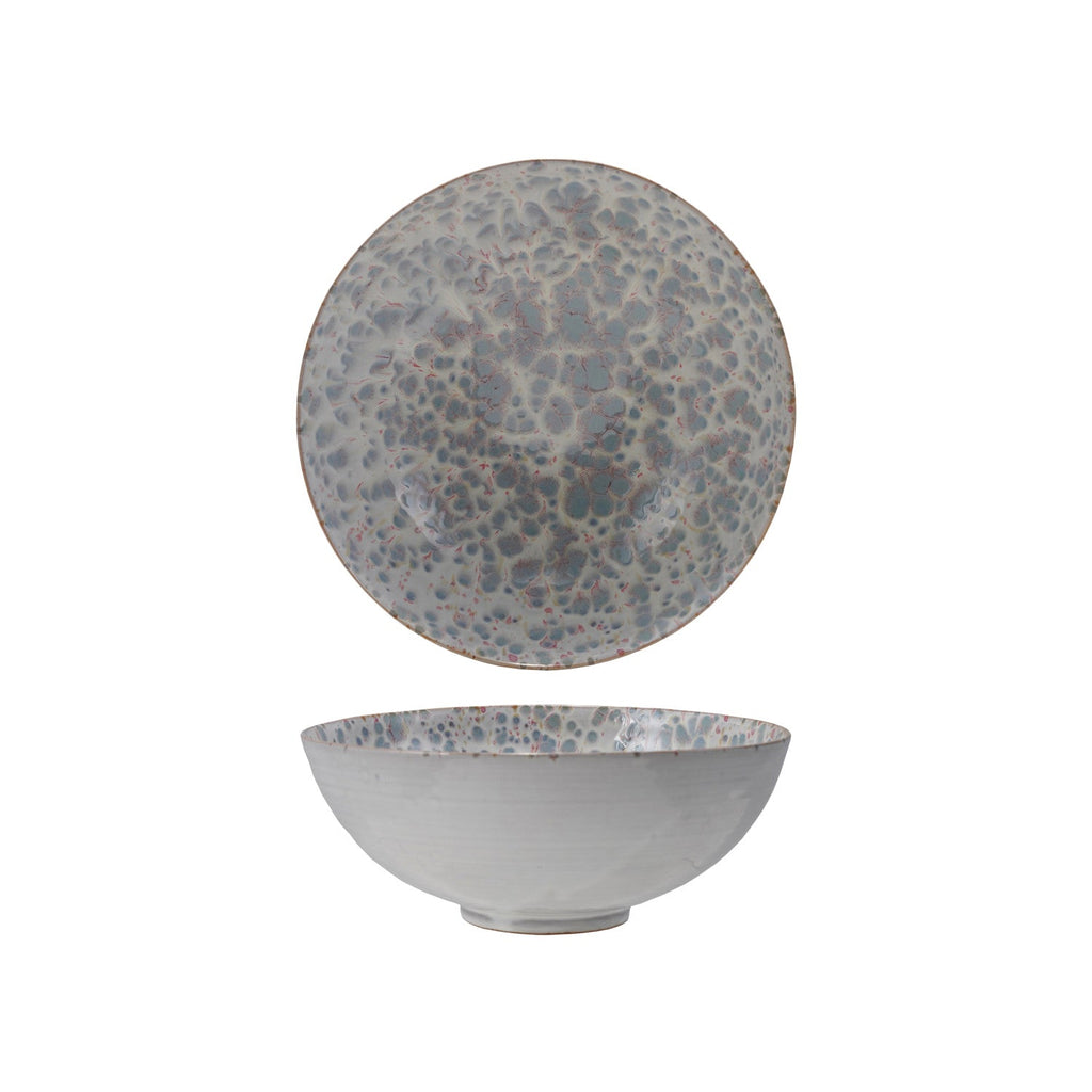 Large stoneware bowl with. blue + white reactive glaze